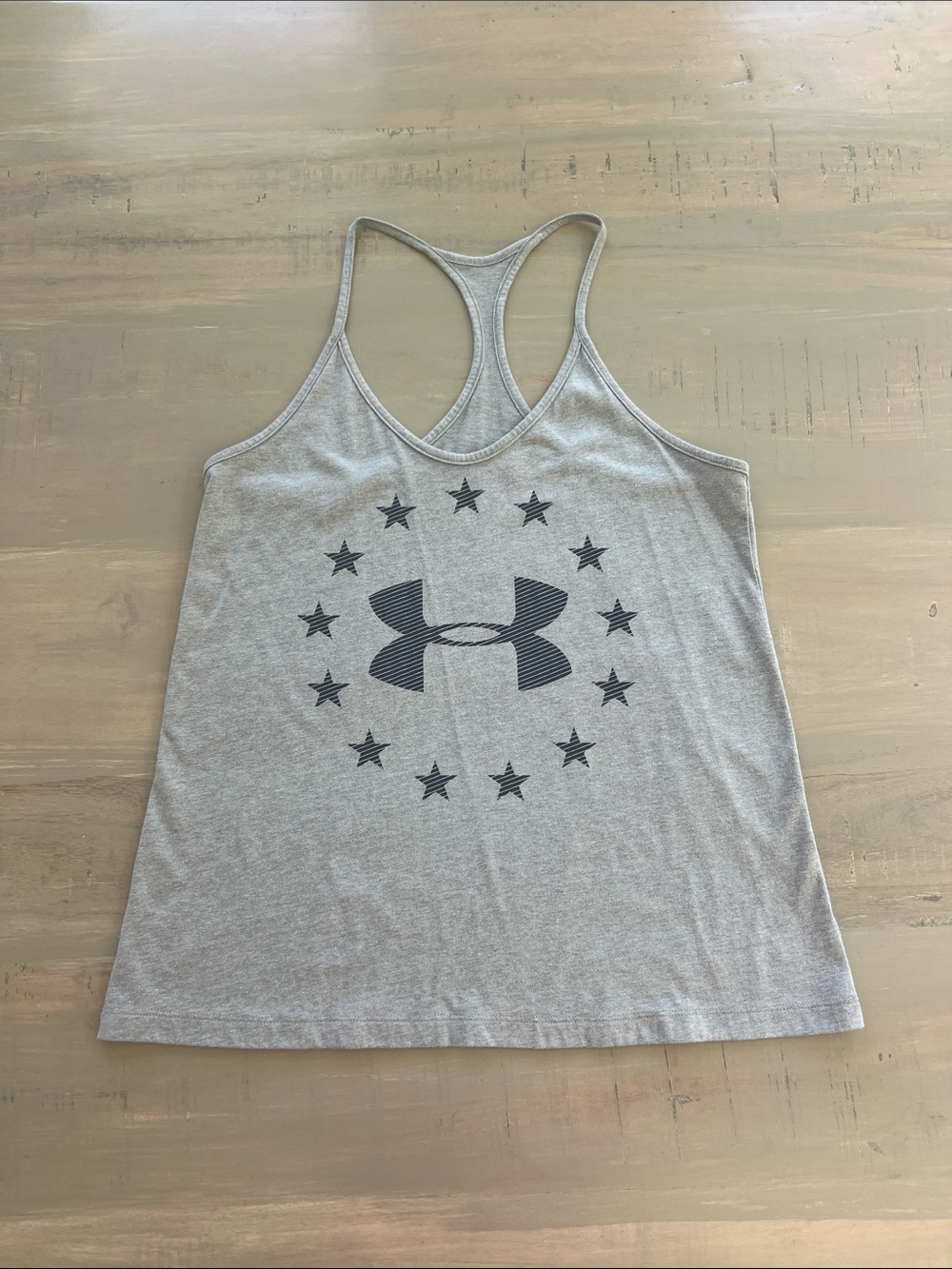 Under Armour Light Gray Racerback Tank with Star Logo. Small / Medium.